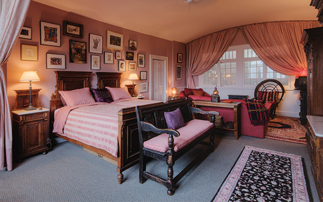 Bed and seat in bedroom