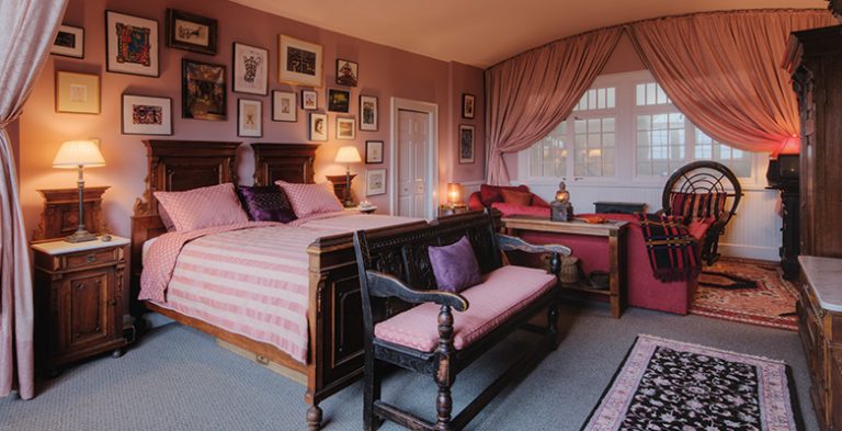 Bed and seat in bedroom