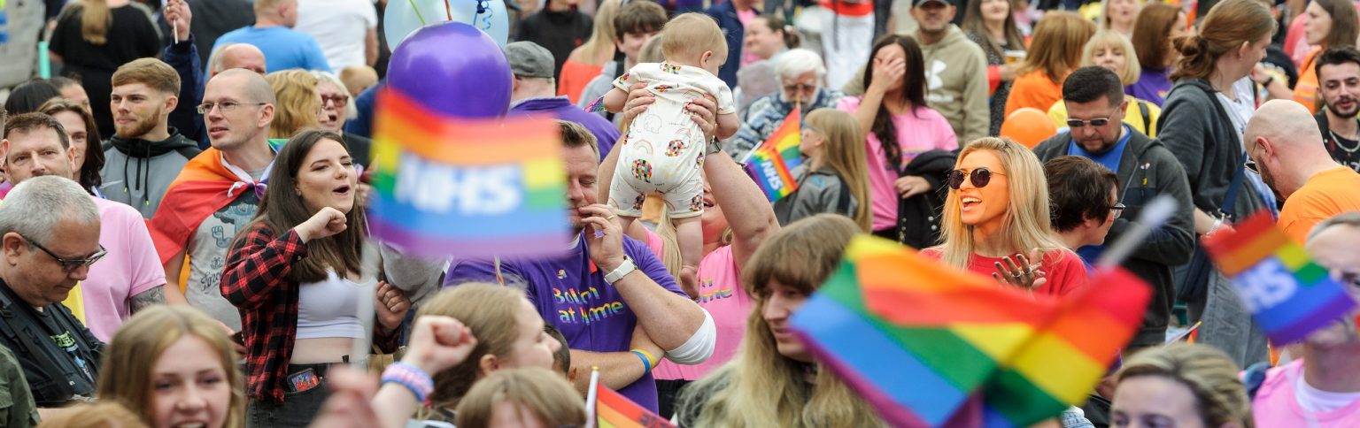 Crowd of people celebrating at Bolton Pride