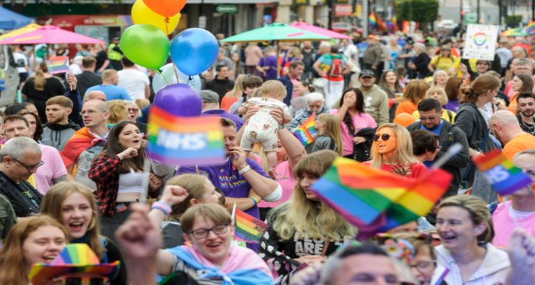 Crowd of people celebrating at Bolton Pride