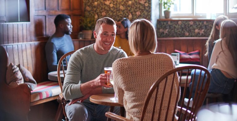 Couple relaxing in a country pub