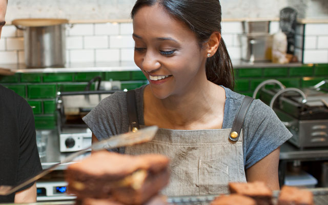 Lady working in a deli